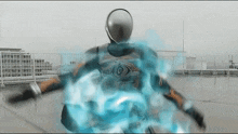 a person in a superhero costume is standing on a rooftop