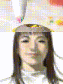 a pixelated image of a woman 's face with a rainbow colored marker on top of her head