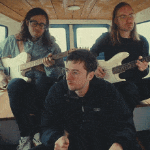 Playing Instruments In The Van Cloud Nothings GIF - Playing Instruments In The Van Cloud Nothings Running Through The Campus Song GIFs