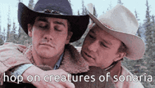 two men in cowboy hats hugging each other with the words hop on creatures of sonaria written below them .