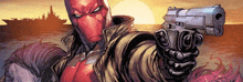 a comic book character named red hood is holding a gun in his hand