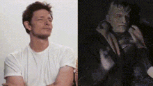 a man in a white t-shirt and a man in a black coat are sitting next to each other .