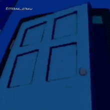 homer simpson from the simpsons is standing in a dark room with his hand outstretched .