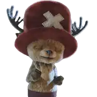 a stuffed animal with antlers wearing a red hat with an x on it