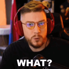 a man with glasses and headphones says what