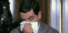 Runny Nose GIF - Runny Nose Blowing Nose Mr Bean GIFs