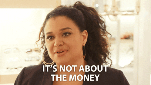 a woman says it 's not about the money in front of a store