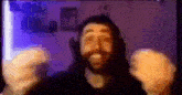 a blurry picture of a man with a beard and headphones