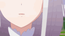a close up of a girl 's face with a small i on her nose