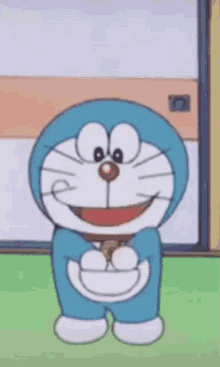 a cartoon character named doraemon is standing in front of a door holding an ice cream cone .