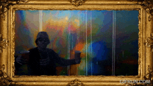a picture of a man holding a cup in a gold frame with gifrun.com written below it