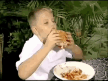 Kid Mess GIF - Burger Eating Mess GIFs