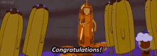a group of cartoon characters are standing around a statue that says congratulations !