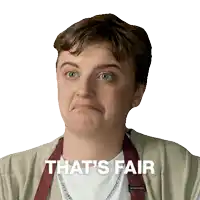 a man making a funny face with the words that 's fair below him