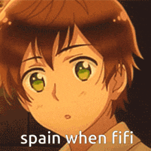 a close up of a boy with green eyes and the words spain when fifi