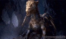 a gif of a dragon with the words irreverentgifs below it