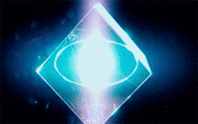 a blue cube with a light coming out of it on a blue background .