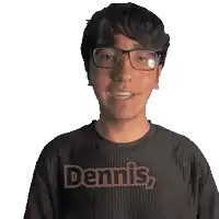a man wearing glasses and a black shirt with the word dennis on it