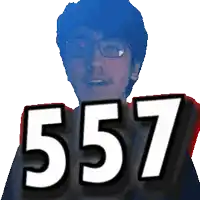 a pixelated image of a man with glasses holding up the number 577