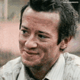 a close up of a man 's face with josephquinngifs written on the bottom right