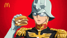 a man in a helmet is holding a hamburger in front of a mcdonald 's sign