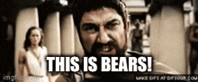a man with a beard is saying this is bears in front of a woman .