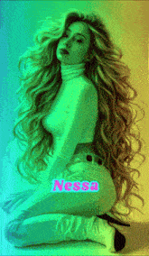a woman with long blonde hair is kneeling down with the name nessa written on her butt