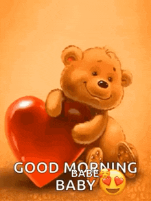 a teddy bear is holding a red heart and saying `` good morning baby '' .