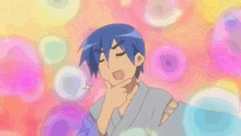 a cartoon character with blue hair is making a funny face with his hand to his chin .