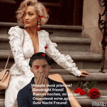 a woman in a white dress is sitting next to a man with hearts on his face