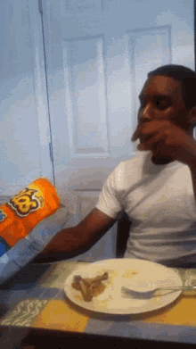 Enjoying Eating Cheetos GIF - Enjoying Eating Cheetos Black Man Eating GIFs
