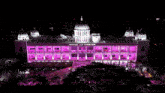 the telangana bhavan building is lit up in pink