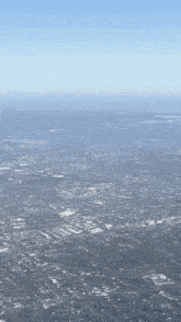 an aerial view of a city and surrounding areas