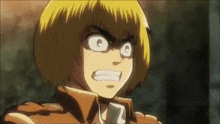 a close up of a cartoon character 's face with a very angry expression .