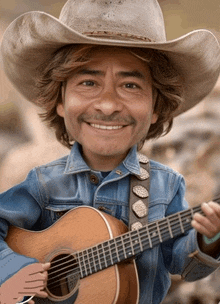 a man in a cowboy hat holds a guitar