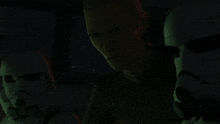 a group of stormtroopers are standing next to each other in the dark
