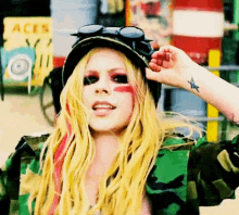 Avril Lavigne Rock And Roll GIF - Avril Lavigne Rock And Roll Tongue Out GIFs