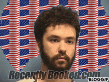 a man with a beard is standing in front of an american flag and the words recently booked.com blog gif