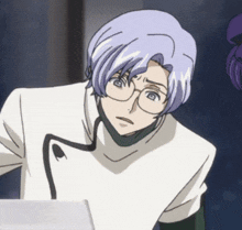 a man with glasses and purple hair looks at something