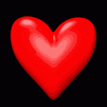 a red heart with the words " clique family " written on it