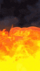 a painting of a yellow and orange fire with a dark background