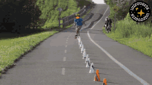 a person riding a skateboard down a road with a logo for introverts