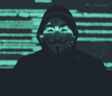 a man wearing a hooded jacket and a mask with a smile on his face