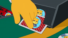 a cartoon of a hand holding two playing cards with cats on them