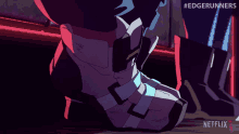a close up of a person 's foot with a netflix logo behind it