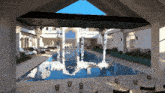 a computer generated image of a swimming pool with candles on the table