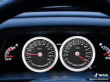 a car dashboard with a tiktok watermark on the bottom right corner