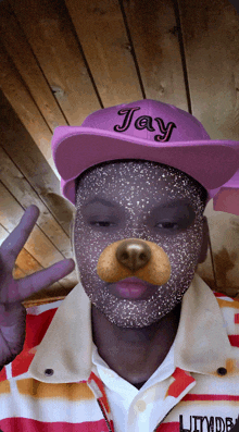 a person wearing a hat that says jay on it