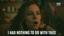 a woman says " i had nothing to do with this " in front of a man