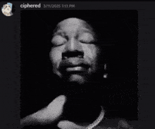 a black and white photo of a man with the words ciphered on the bottom